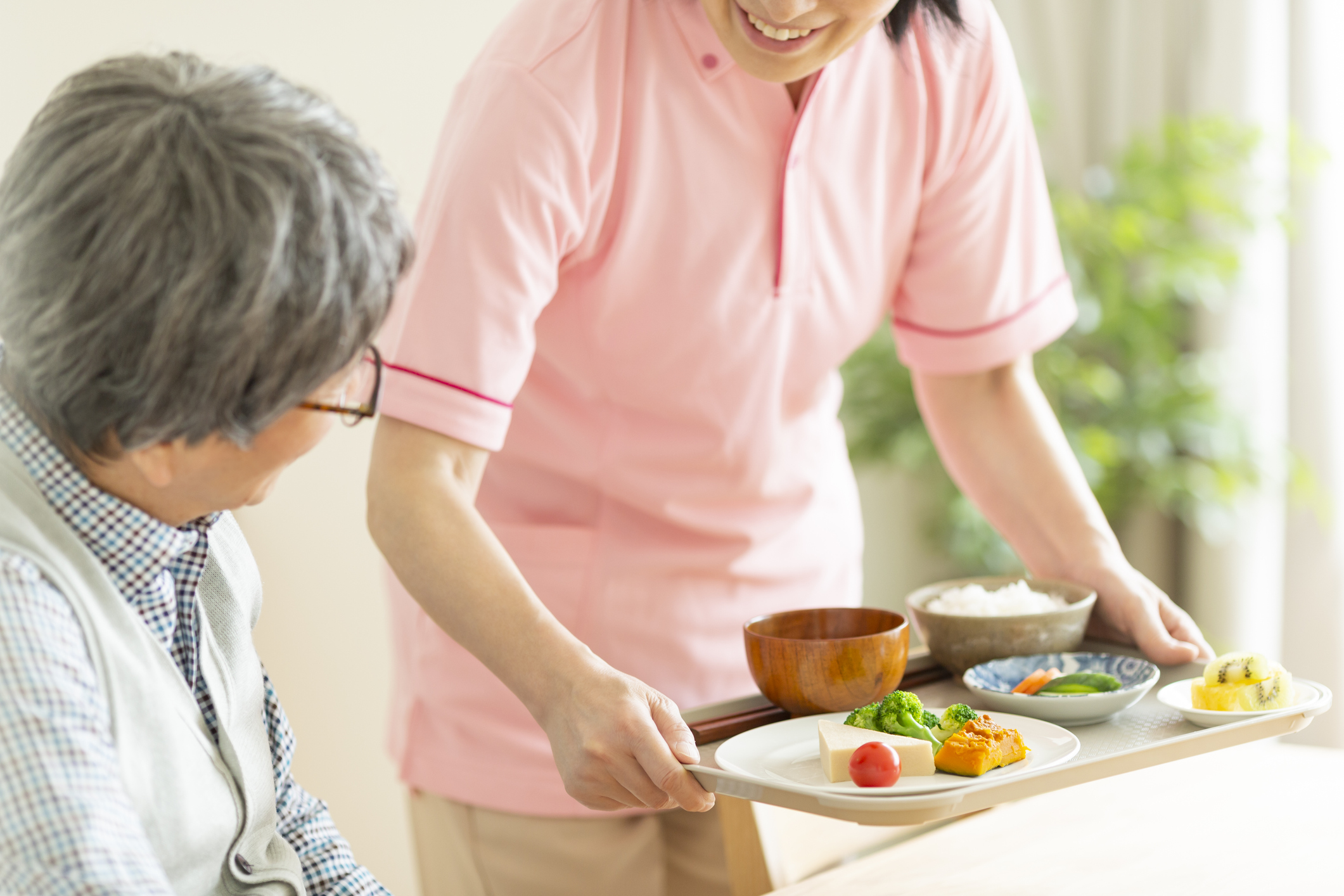 Caregiver preparing a meal